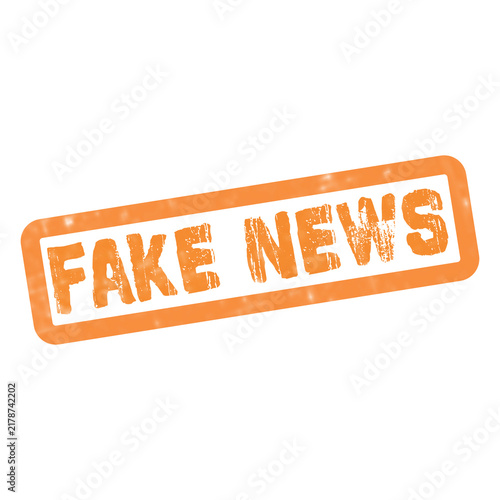 Orange rubber stamp with the text fake news in a rectangular frame for journalism and media fact checking
