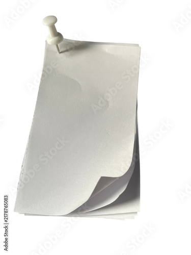 Blank white paper note attached with a small plastic push pin for reminders and important office messages