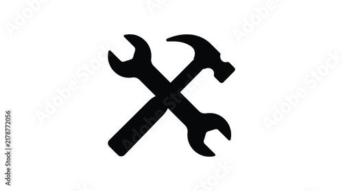 Wrench and hammer silhouette against a white background