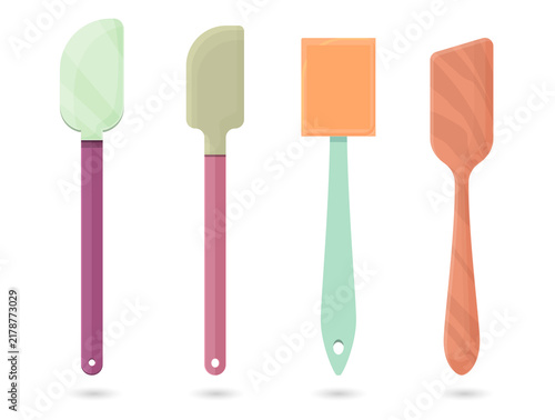 Cuadro en lienzo Colorful kitchen spatulas for cooking and baking transparent background