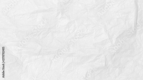 The background is white. Texture of paper with kinks and dents, old and dilapidated.