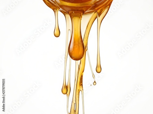 A natural sweetener for food and beverage design, golden honey drips on a white background.