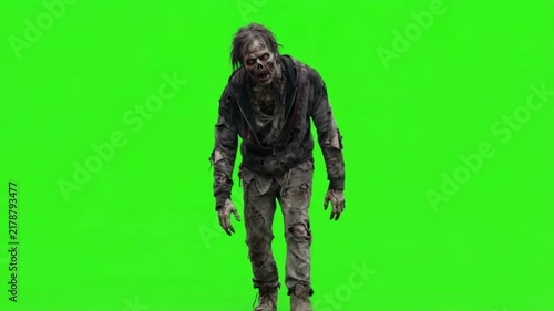 Walking zombie monster on a green screen background, chroma key