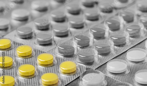 Bild auf Leinwand Medicines for patients. Yellow tablets in a blister pack.