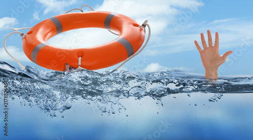 Canvastavla Man drowning in sea trying to catch lifebuoy, closeup