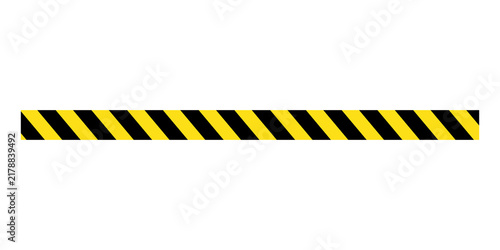 Yellow and black hazard warning tape strip with diagonal stripes