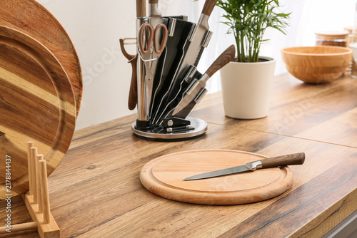 Obraz na plátně Home cooking and meal preparation, wooden cutting board with kitchen knife on a