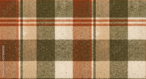 Seamless fabric texture of a classic plaid pattern with warm autumn colors including olive green, burnt orange, and cream beige wool textile