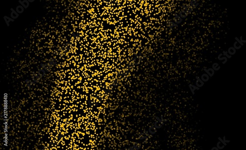 Abstract golden particles and sparkling dust on a dark black background, creating an elegant glowing texture