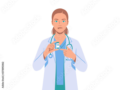 Professional Doctor Holding And Pointing To A Vaccine Vial With Stethoscope