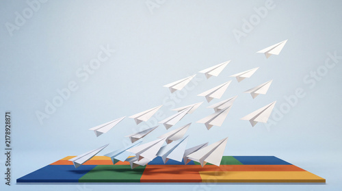 Paper planes rising from a creative platform