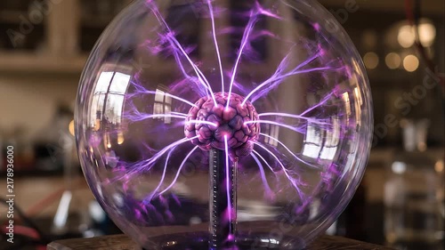 Anatomical brain model within electric sphere.
