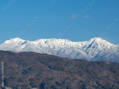 Plakat 早春の雪に覆われた八ヶ岳