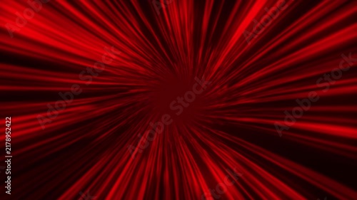 A vibrant red video background with dynamic light rays moving outward in a circular motion, creating a sense of energy and motion in a dark space.