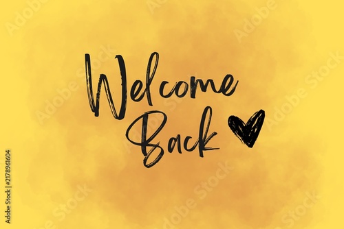 Welcome back handwritten black lettering with heart on yellow watercolor background