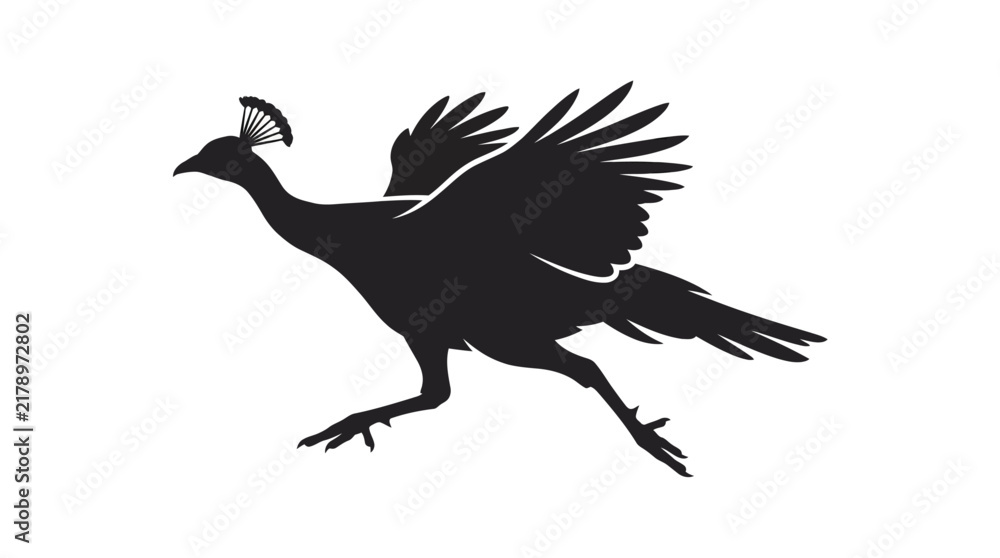 Fototapeta premium A striking black silhouette of a pheasant bird running with outstretched wings in a dynamic pose isolated on a white background