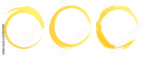 Set of yellow brush stroke circles, circular hand drawn paint frames, round grunge borders isolated on white background