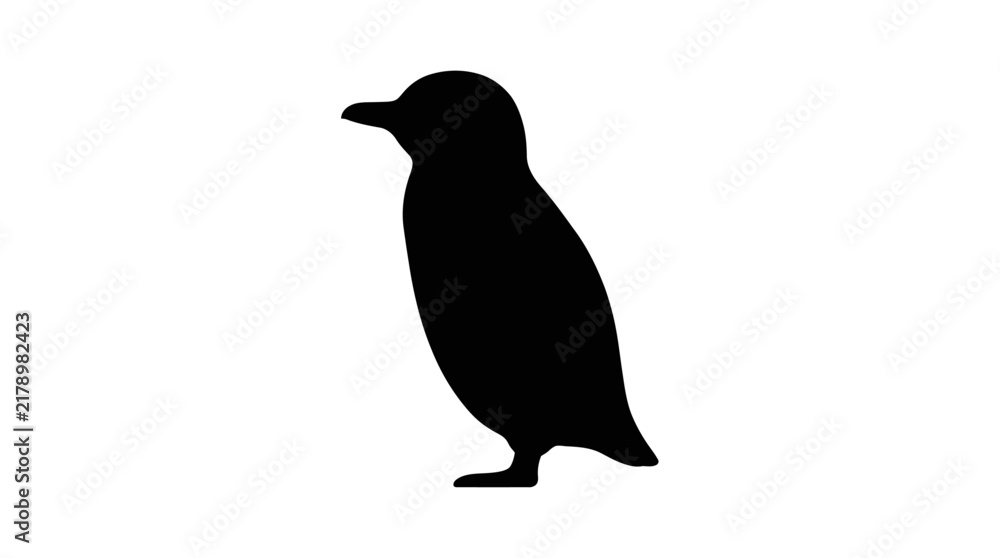 Fototapeta premium Black silhouette of a cute little penguin standing sideways isolated on a clean white background