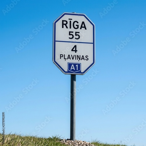 Road Sign To Riga And Plavinas On A Clear Sunny Day