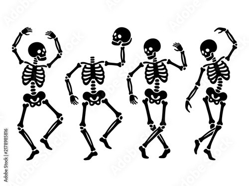 Set of black silhouette skeletons in dancing poses isolated on a plain white background