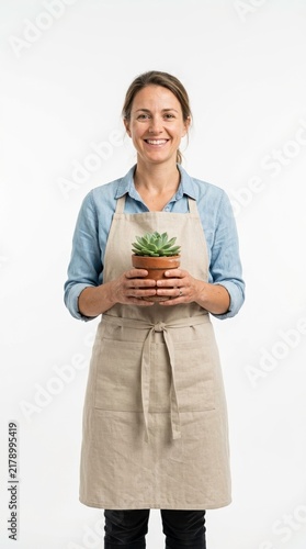Smiling Woman in Apron Holding Potted Succulent Plant Against White Background