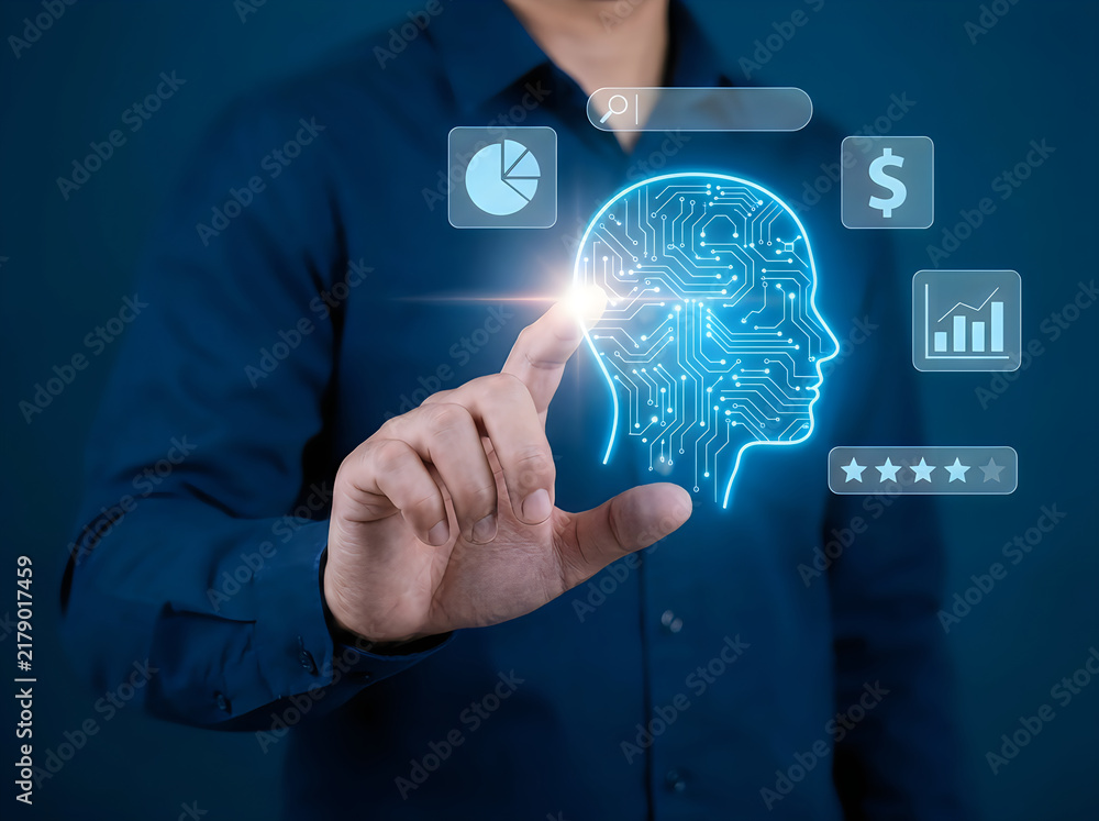 Obraz premium A businessman in a blue shirt touching a glowing digital human head integrated with circuit board patterns and various financial data charts