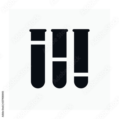 Картината върху платно Three black test tubes in a row on white background laboratory equipment science