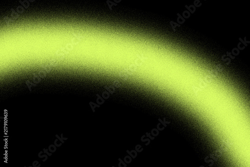A bright lime green curved light arc glows against a deep black background creating a minimalist abstract visual effect with soft edges and texture