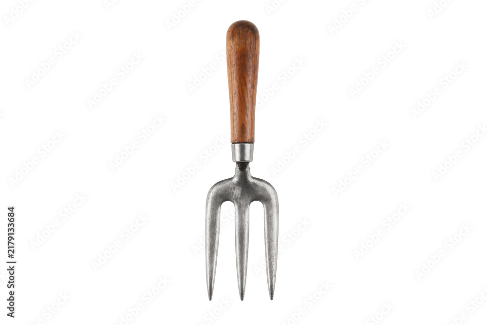 Fototapeta premium Single vintage metal hand fork with a rustic wooden handle is centrally positioned on a clean white background