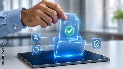 Hand moving a verified digital document into a folder on a tablet, symbolizing secure data management and workflow