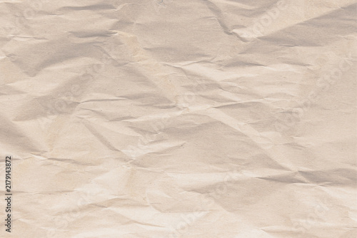 Soft crumpled cream paper texture background for handmade wedding invitation and craft design
