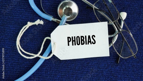 Quadro su tela Glasses, a stethoscope and a paper tag with the word phobias