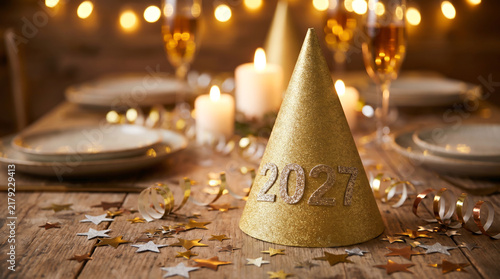 Festive Table Setting for New Year's Eve Celebration with 2027 Party Hat