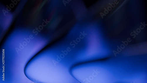 Dark Indigo Blue Abstract Blur Background with Curved Wave Shadows and Ambient Soft Glow for Modern Cyber Presentation, Tech Cover, Digital Banner, and Wallpaper