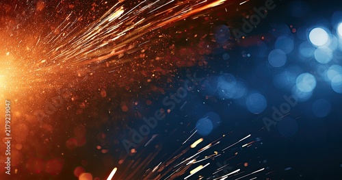 Explosion of Fiery Sparks and Bokeh Lights Abstract Background.