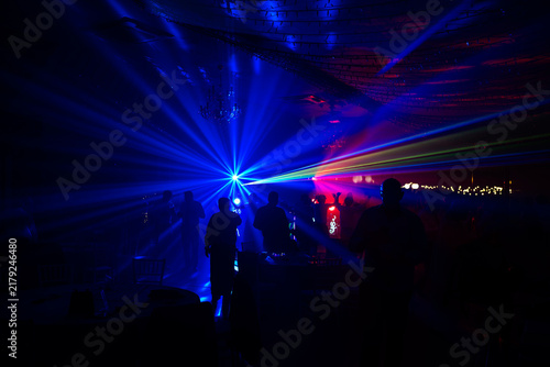 Unrecognizable people dancing in a nightclub