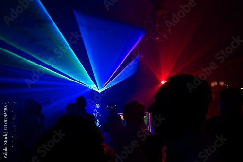 Unrecognizable people dancing in a nightclub