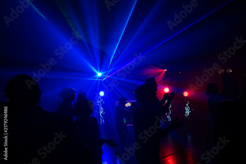 Unrecognizable people dancing in a nightclub