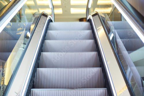 Modern Escalator with Illuminated Handrails Perspective View in Building