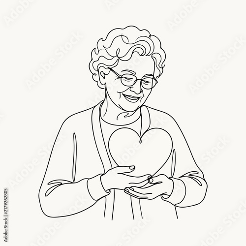Senior woman holding heart with joyful expression while displaying love and care. Heart symbolizes affection and warmth in elderly relationships.