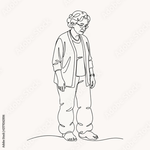 Elderly woman with leg edema standing barefoot in casual clothes, showing signs of discomfort. Elderly woman appears concerned about her leg swelling, highlighting health issues related to seniors.