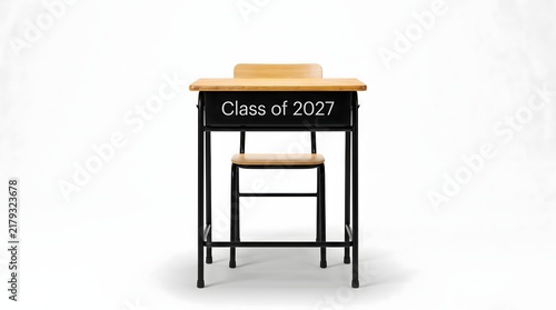 A single wooden school desk with a matching chair featuring a black metal frame isolated on a white background for educational and classroom design