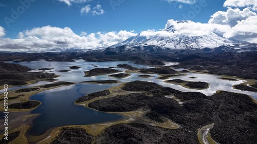 Cotacotani lake with snowy parinacota volcano. High quality 4k drone footage