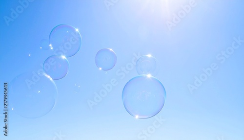 Soap Bubbles Floating in Blue Sky Illustration