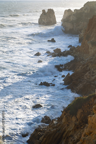 Obraz na plátně Big waves crushing on coastal cliffs at Ponta da Baleeira in Albufeira, Portugal
