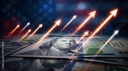 Us dollar banknotes with glowing upward arrows representing financial growth and economy