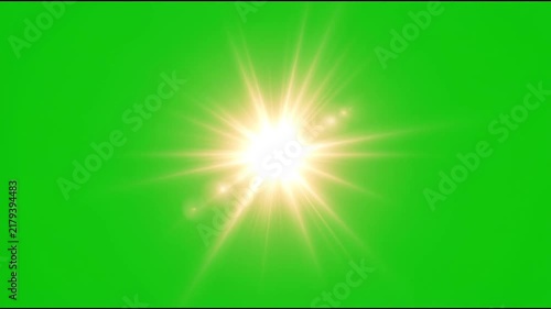 Bright sun lens flare effect on green screen background.
