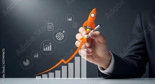 A businessman's hand drawing an upward growth chart with a rocket, symbolizing business success and startup launch.