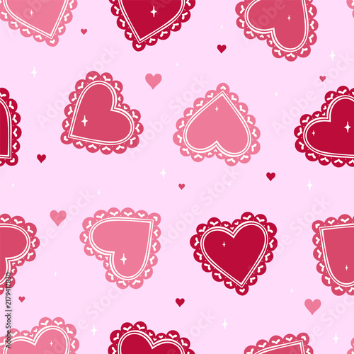 Seamless pattern with pink and red lace hearts on a pink background