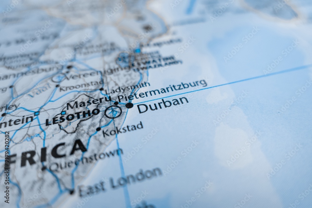 Naklejka premium Map of Durban styled in grey color. Selective focus on label, close-up view